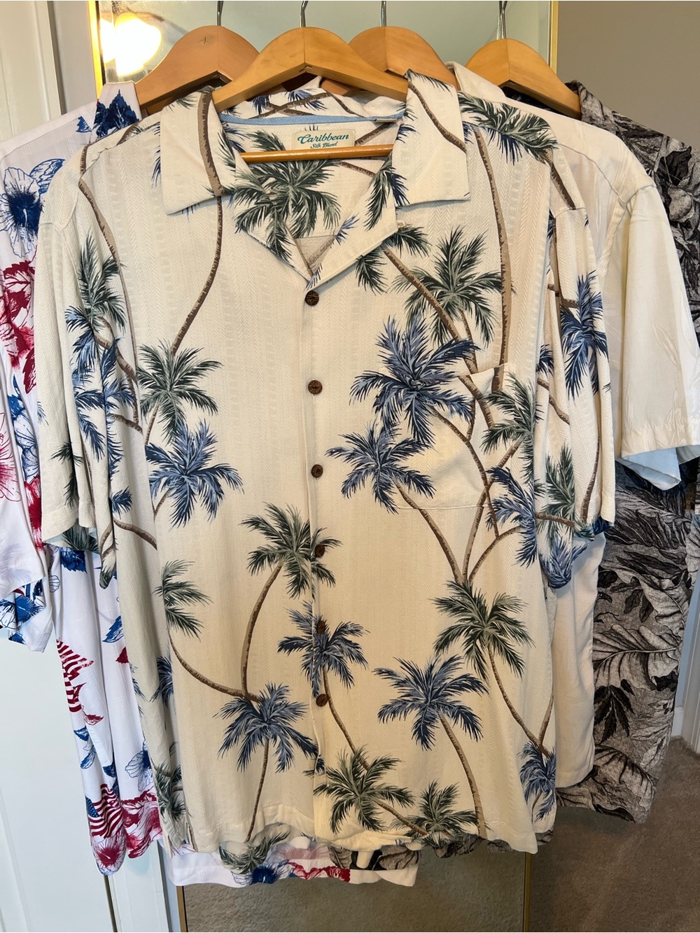 4 button up shirts 1 price!!!

1 Tommy Bahama
2 Caribbean Joe 
1 Van-Heusen Silk